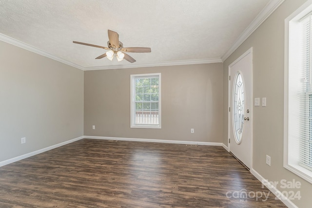 entrance foyer with ornamental molding, ceiling fan, hardwood / wood-style flooring, and a textured ceiling