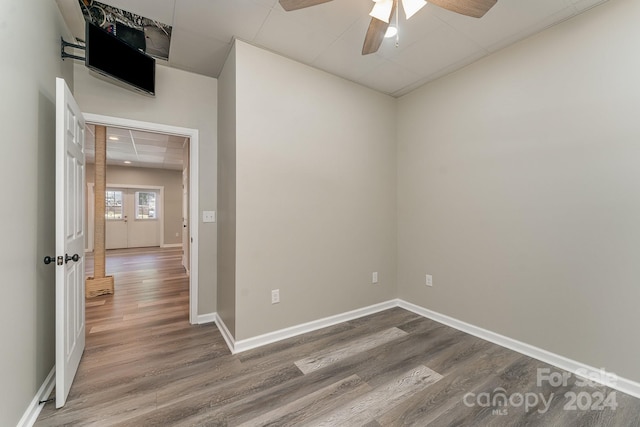 unfurnished room featuring hardwood / wood-style flooring and ceiling fan