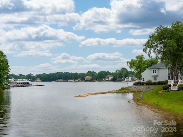 property view of water featuring a boat dock