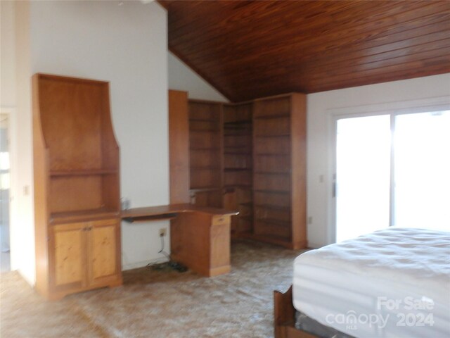 carpeted bedroom with lofted ceiling and wooden ceiling