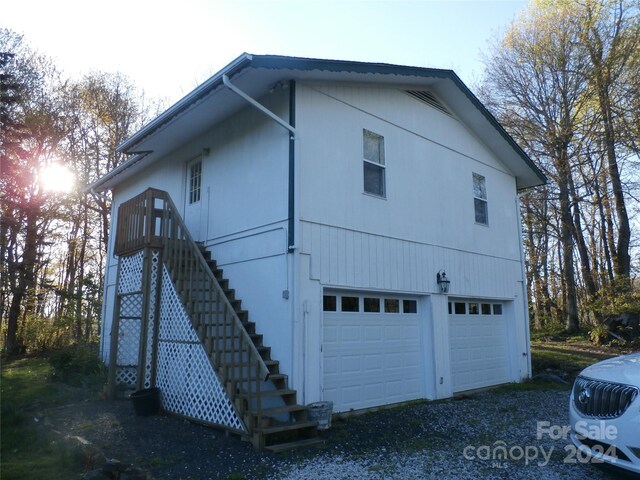 view of home's exterior with a garage