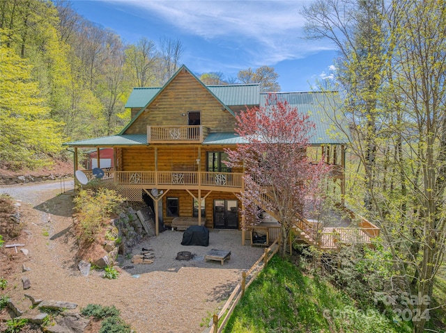 view of front of home with a wooden deck