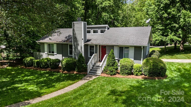 view of front of home with a front yard