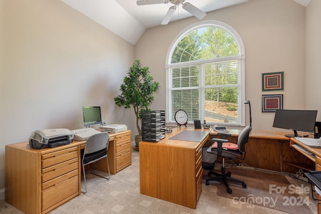 carpeted office with ceiling fan and lofted ceiling