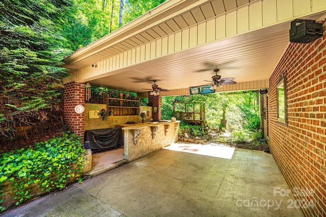 view of patio featuring ceiling fan