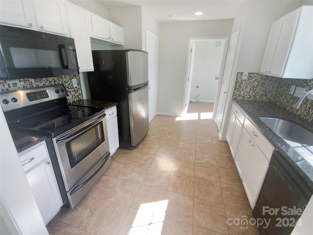 kitchen featuring light tile floors, white cabinets, sink, backsplash, and black appliances