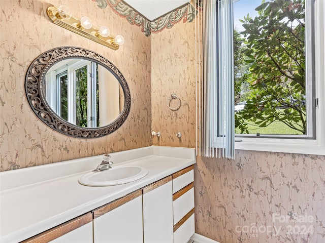 bathroom featuring large vanity