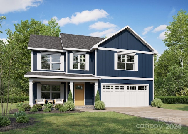 view of front of property with a garage, a front yard, and covered porch