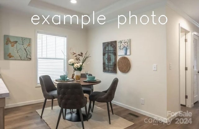 dining room featuring wood-type flooring