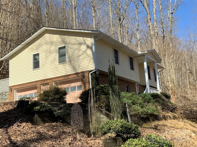 view of property exterior featuring a garage