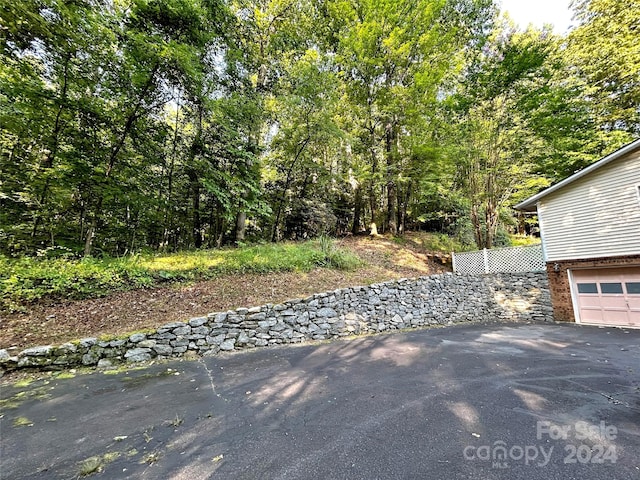 view of patio featuring a garage