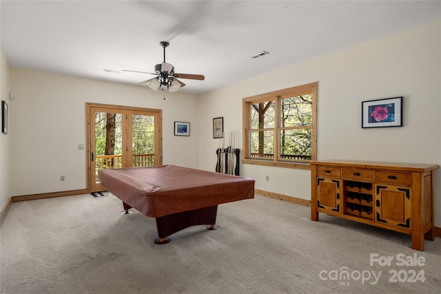 game room featuring french doors, light colored carpet, ceiling fan, and billiards