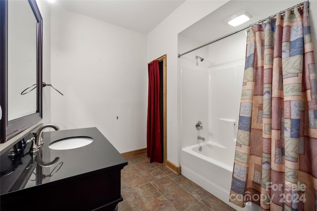 bathroom with shower / tub combo, vanity, and tile flooring