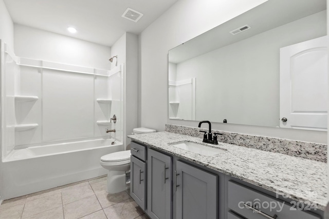 full bathroom featuring tile flooring,  shower combination, vanity, and toilet