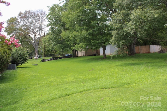 view of yard with central AC