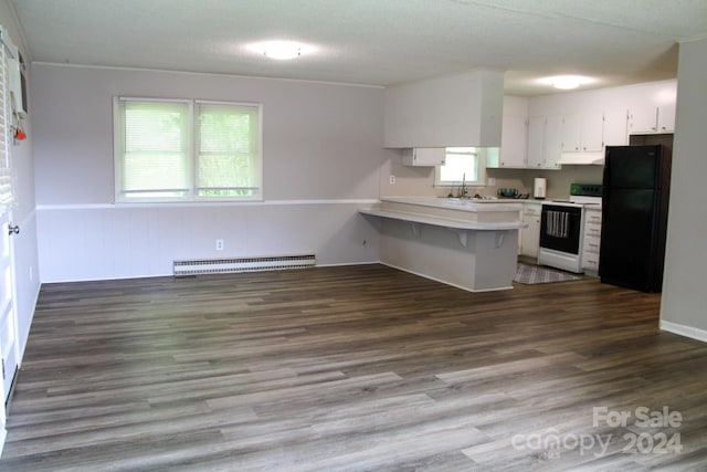 kitchen with baseboard heating, black fridge, kitchen peninsula, electric stove, and white cabinets