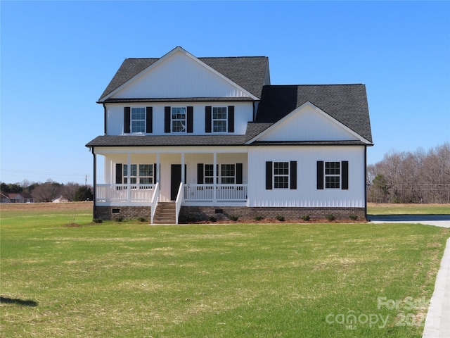 view of front of property featuring a porch and a front lawn