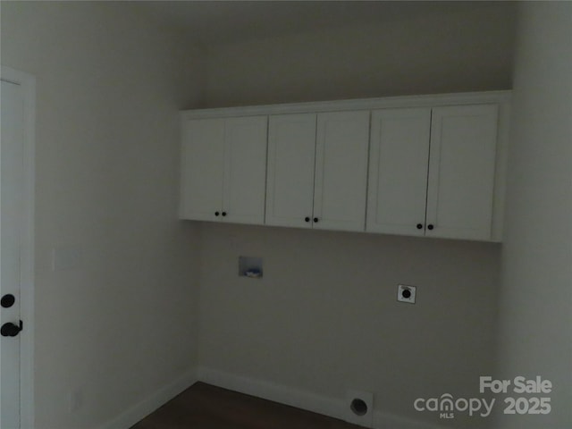 laundry area with cabinets, washer hookup, and electric dryer hookup