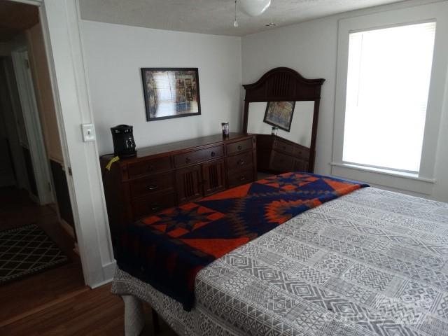 bedroom featuring hardwood / wood-style floors