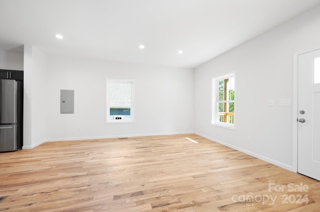 unfurnished room featuring light hardwood / wood-style flooring