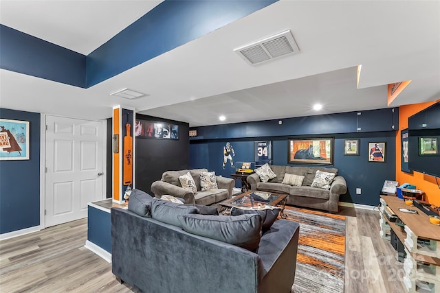 living room with hardwood / wood-style flooring