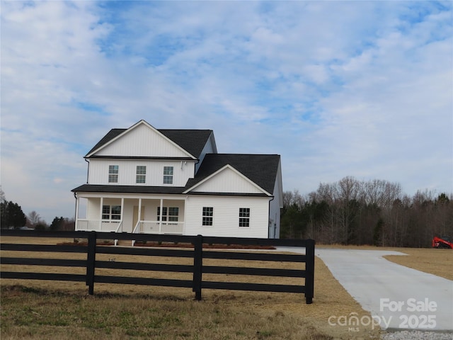 view of front of home featuring covered porch