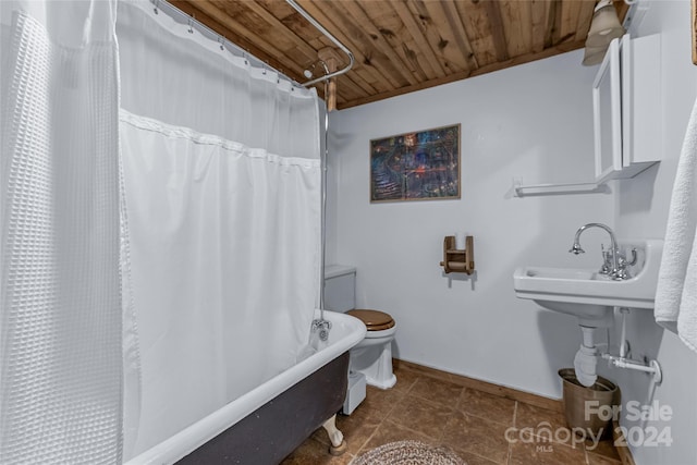 bathroom featuring tile flooring, shower / bath combo, toilet, and wooden ceiling