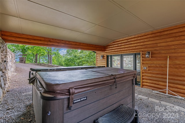 view of patio with a hot tub