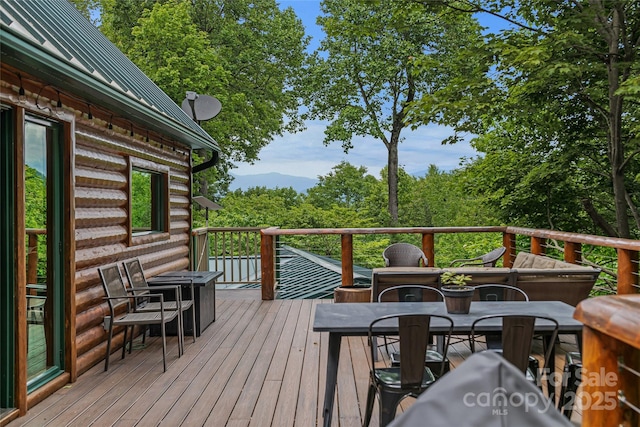 18 Hummingbird Hl, Black Mountain, NC 28711 - wooden terrace with outdoor dining area and a mountain view