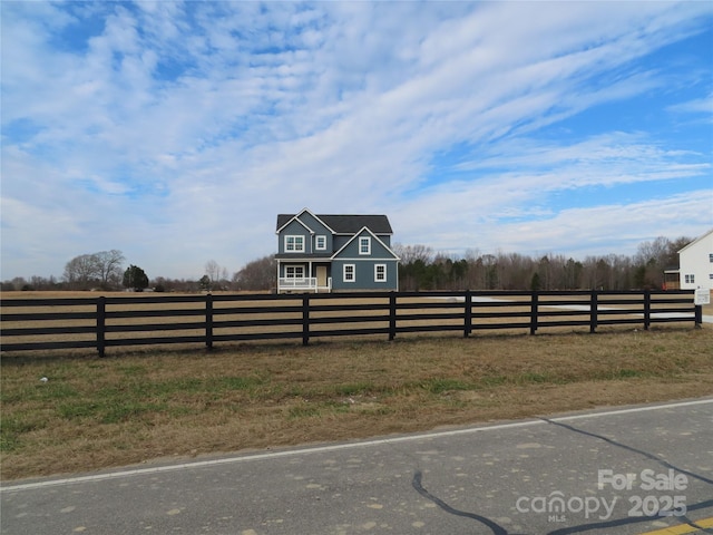 view of yard featuring a rural view