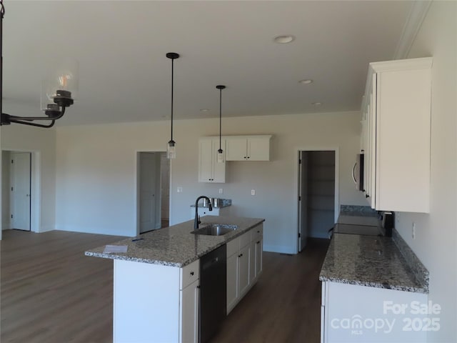 kitchen with white cabinetry, sink, dark stone countertops, and dishwasher