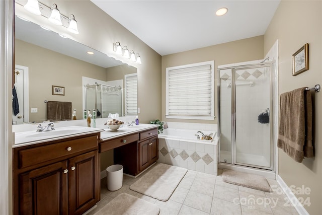 bathroom featuring vanity, separate shower and tub, and tile patterned floors