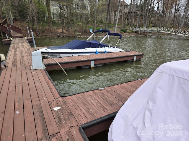 view of dock with a water view