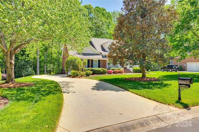 view of front of home with a front lawn