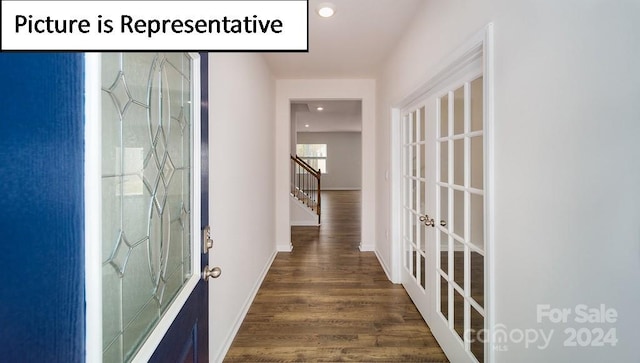 interior space with dark hardwood / wood-style floors