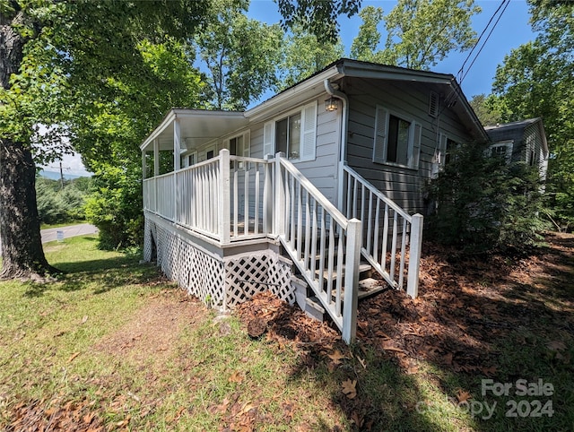 exterior space featuring a yard