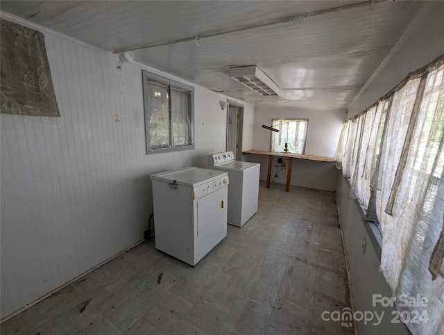 washroom featuring independent washer and dryer