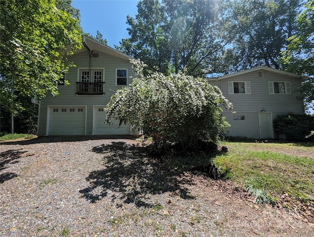 view of property exterior featuring a garage