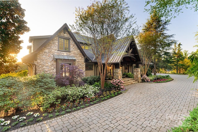 view of front of home featuring stone siding