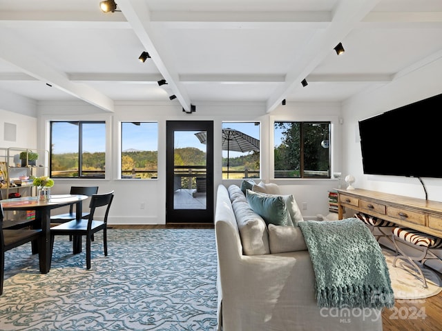 living room with beamed ceiling, hardwood / wood-style floors, and coffered ceiling