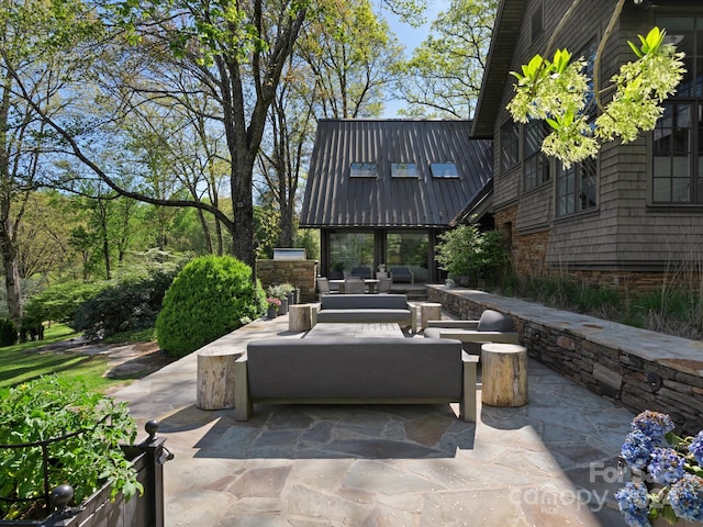 view of patio / terrace with an outdoor hangout area