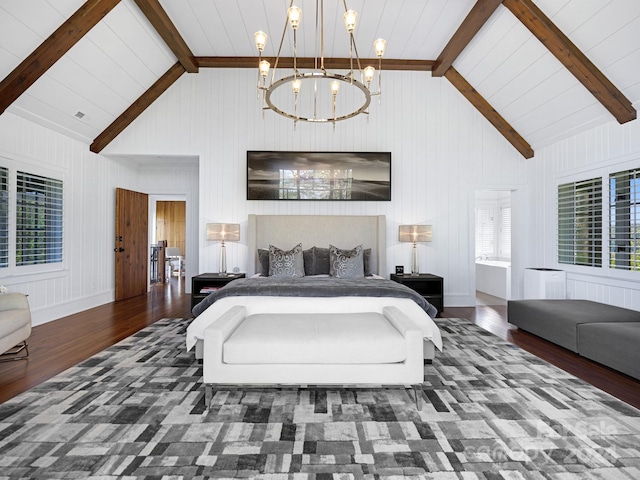 bedroom with beamed ceiling, a notable chandelier, wood finished floors, and high vaulted ceiling