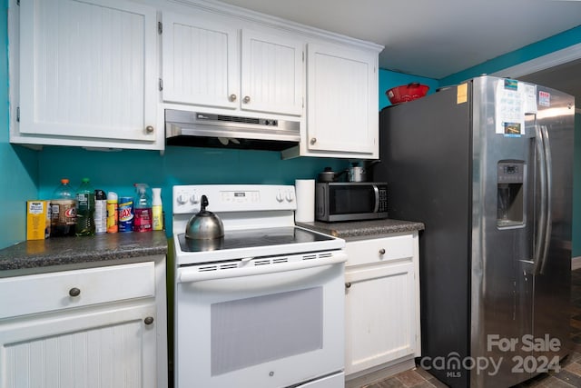 kitchen featuring white cabinets and appliances with stainless steel finishes