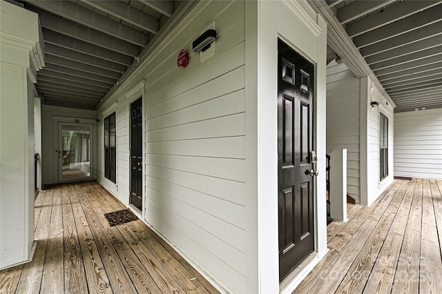 wooden terrace featuring a porch