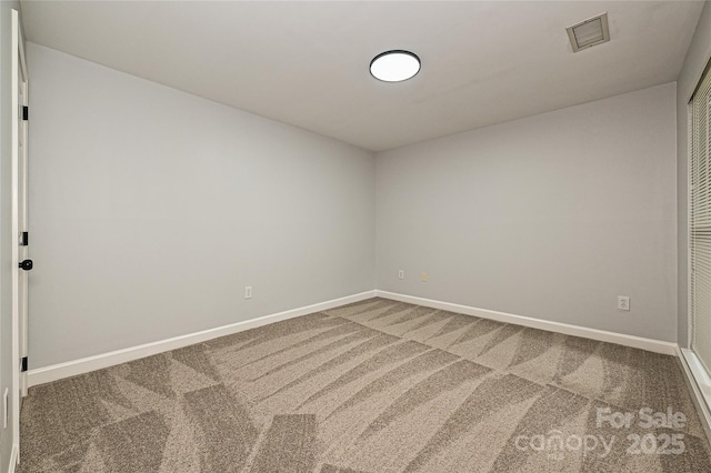 empty room with carpet floors