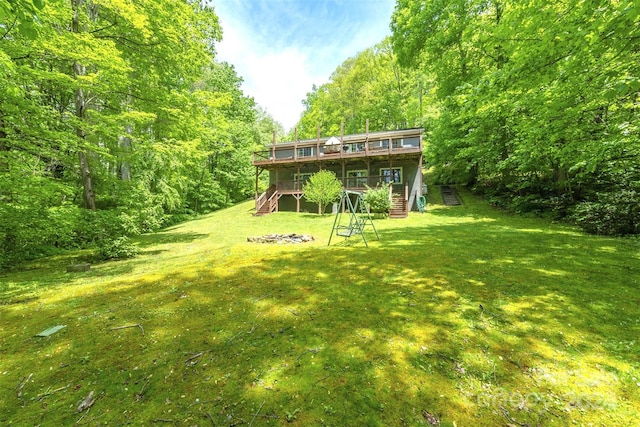 view of yard featuring a deck