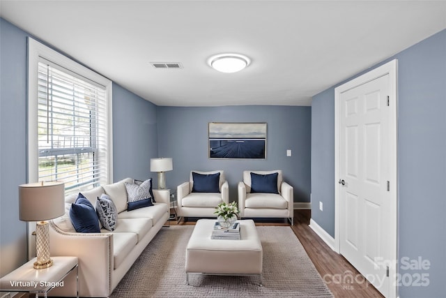 living room with dark wood-type flooring