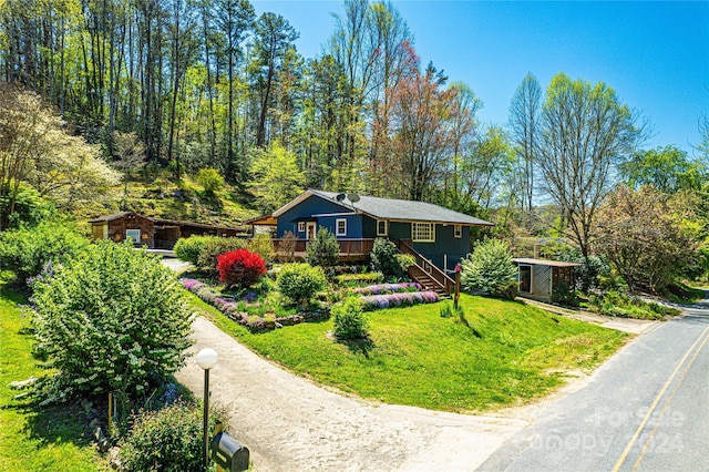 ranch-style house with a front yard