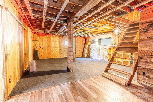 basement featuring wood-type flooring