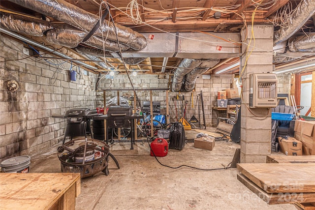 basement featuring heating unit